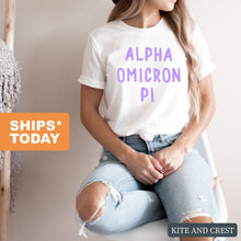 Load image into Gallery viewer, Alpha Omicron Pi T-shirt - AOPI Purple Bubble Letters Tee - Kite and Crest