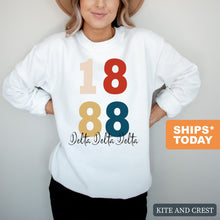 Load image into Gallery viewer, Delta Delta Delta Sweatshirt | Tri Delta Colorful Year Crewneck Sweatshirt | Delta Delta Delta Sorority Gift Idea - Kite and Crest