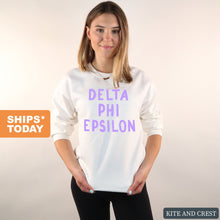 Load image into Gallery viewer, Delta Phi Epsilon Sweatshirt - DPHIE Purple Bubble Letters Crewneck Sweatshirt - Kite and Crest