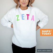 Load image into Gallery viewer, Zeta Tau Alpha Sweatshirt | Zeta (ZTA) Rainbow Letter Crewneck Sweatshirt | Zeta Tau Alpha Sorority Gift Idea - Kite and Crest