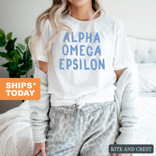 Load image into Gallery viewer, Alpha Omega Epsilon Blue Bubble Letters T-shirt - Kite and Crest
