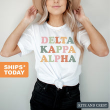 Load image into Gallery viewer, Delta Kappa Alpha For Everyone Comfort Colors T-Shirt - Kite and Crest
