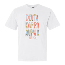 Load image into Gallery viewer, Delta Kappa Alpha Pastel Stencil Comfort Colors T-Shirt - Kite and Crest
