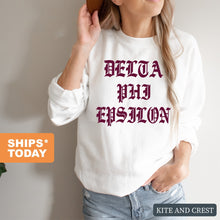 Load image into Gallery viewer, Delta Phi Epsilon Sweatshirt | DPHIE Old Type Written Crewneck Sweatshirt | Delta Phi Epsilon Sorority Gift Idea - Kite and Crest
