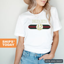 Load image into Gallery viewer, Delta Zeta T-shirt - Dee Zee (DZ) Golden Stripes Tee - Kite and Crest
