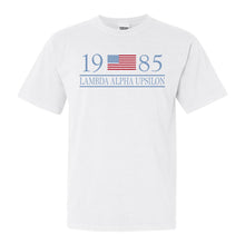 Load image into Gallery viewer, Lambda Alpha Upsilon Flag Year Comfort Colors T-Shirt - Fraternity Tee - Kite and Crest
