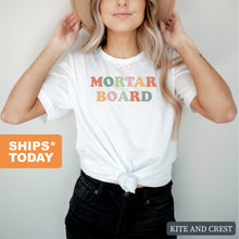 Load image into Gallery viewer, Mortar Board Bright and Colorful T-shirt - Kite and Crest

