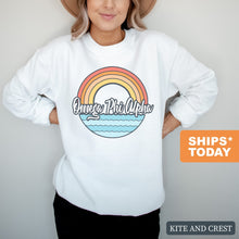 Load image into Gallery viewer, Omega Phi Alpha Wavy Rainbow Crewneck Sweatshirt - Kite and Crest
