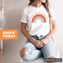 Load image into Gallery viewer, Tau Beta Sigma Colorful Rainbow T-shirt - Kite and Crest
