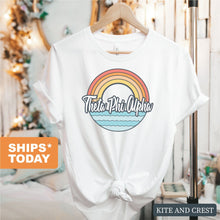 Load image into Gallery viewer, Theta Phi Alpha T-shirt - Theta Phi Wavy Rainbow Tee - Kite and Crest
